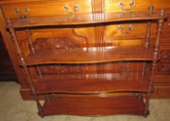 A late 19th century mahogany hanging shelves