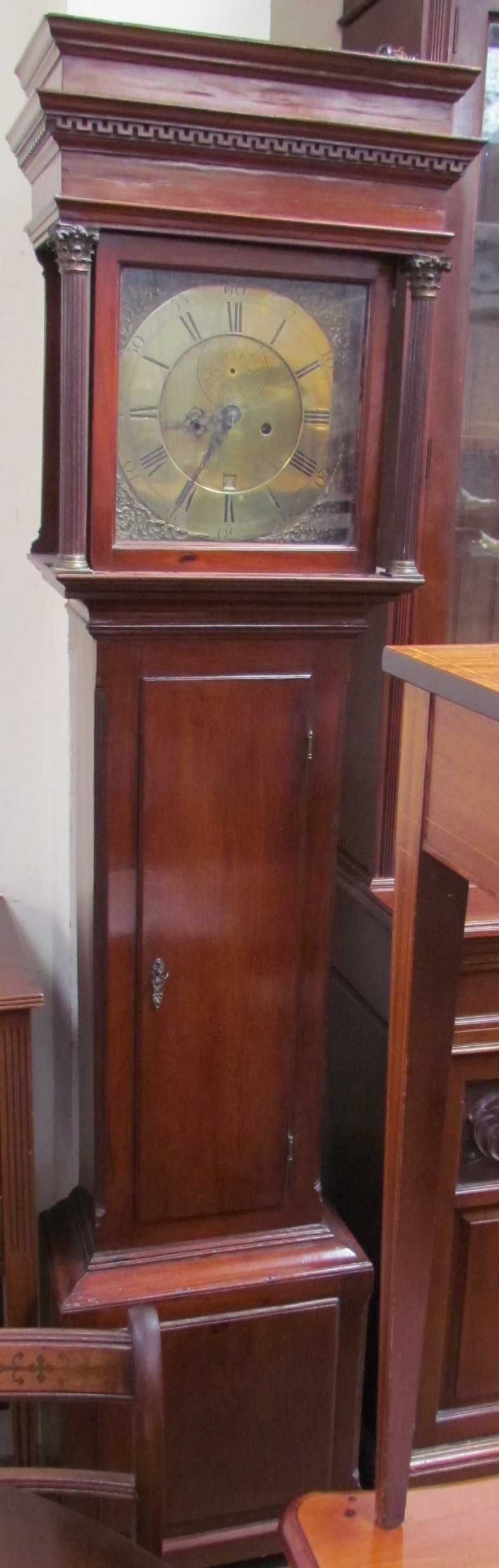 A 19th century mahogany longcase clock, with a stepped hood above a long trunk door, - Image 2 of 2