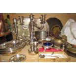 Assorted electroplated wares and brasswares, including candlesticks,