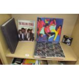 Rolling Stones, Slow rollers together with a collection of Rolling Stones albums,