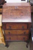 A 20th century walnut bureau,