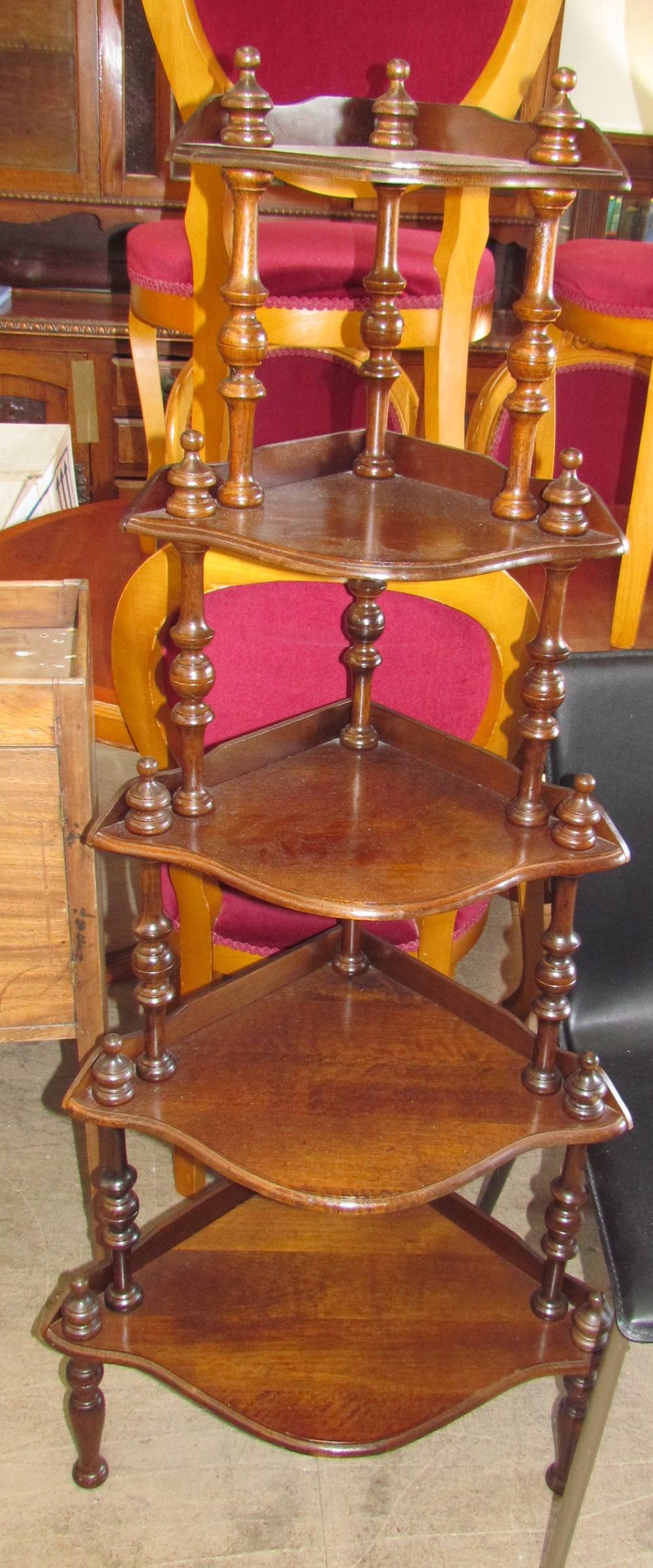 A reproduction mahogany corner whatnot,