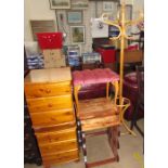 A pair of pine bedside chests each with three drawers on ball feet together with an upholstered