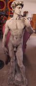 A composition garden statue depicting Michelangelo's David
