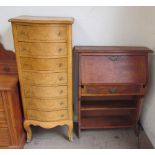 A birds eye maple chest with a serpentine top above seven graduated drawers on cabriole legs and