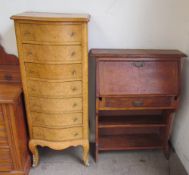 A birds eye maple chest with a serpentine top above seven graduated drawers on cabriole legs and