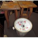 Two carved occasional tables with carved tops together with a pottery bucket with filter lid
