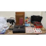 A leather writing slope and letters, together with a typewriter, leather case, stamps, teapot,