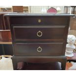 A Stag bedside chest with a pull out slide and two drawers together with a double bed head and foot