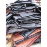 A large quantity of leather trousers and skirts by High street brands, some with tags, Phase Eight,