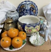 A blue and white twin handled vase together with figures, pottery oranges, vases,