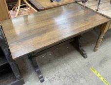 A 20th century oak refectory table,
