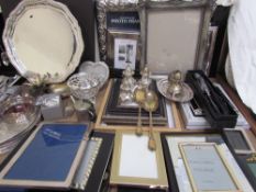 A Mappin and Webb electroplated salver, together with a collection of photograph frames,