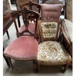 A matched pair of Edwardian walnut salon chairs,