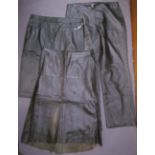 Two black leather skirts by DKNY, size 14 with tags and a size 10,