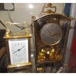 A Morell & Hilton carriage clock and an anniversary clock
