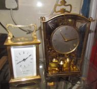 A Morell & Hilton carriage clock and an anniversary clock