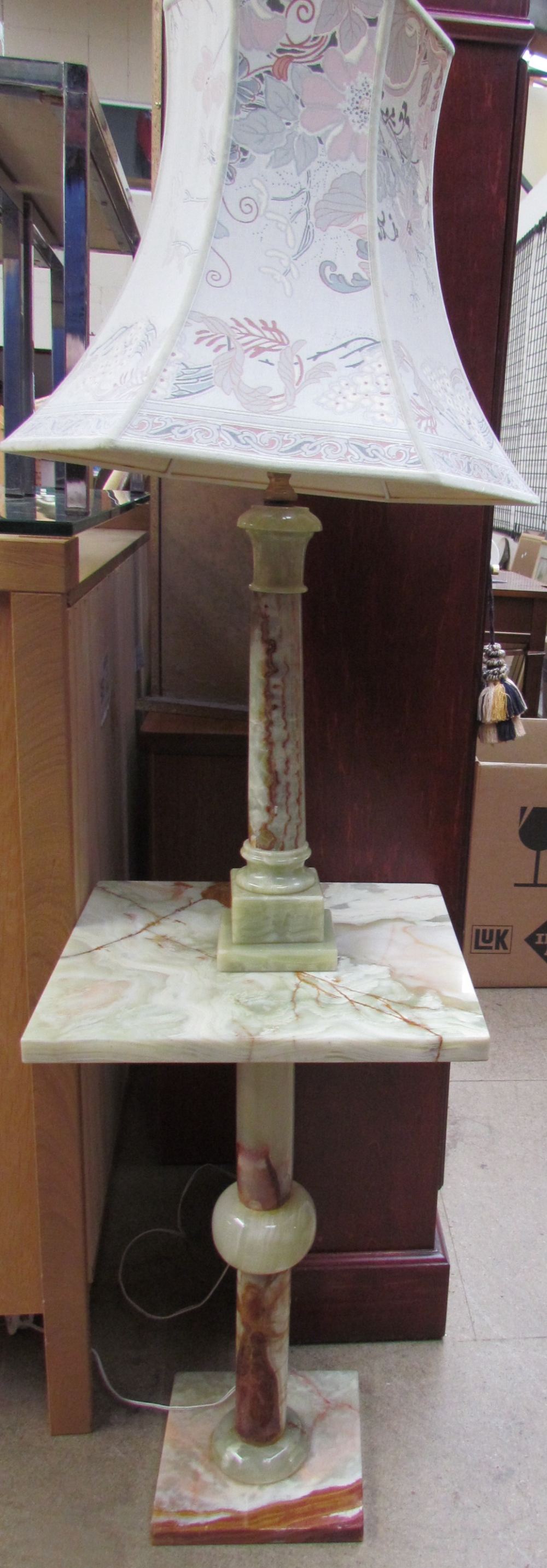 An onyx Ionic column table lamp together with an onyx side table