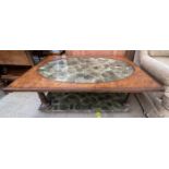 A 20th century walnut and reconstituted stone coffee table,