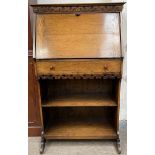 An early 20th century oak bureau,