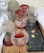 A collection of glass oil lamp and gas lamp shades and a pottery tray