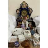 A Wade figure Anton together with a Doulton figure, pottery clock, decorative figures,