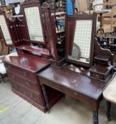 An Edwardian dressing table with a rectangular mirror above a pair of drawers on ring turned legs