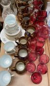 A Mary Gregory cranberry glass jug together with other cranberry glass,