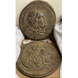 A set of three resin wall plaques of antique coins
