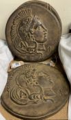 A set of three resin wall plaques of antique coins