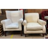 A George III style wing back elbow chair with cream upholstery on square tapering legs together