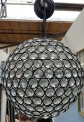 A globe chandelier with cut glass beads together with a glass and chrome chandelier
