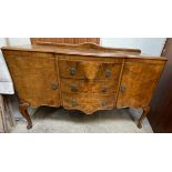 A 20th century Burr Walnut sideboard with three drawers and two cupboards,