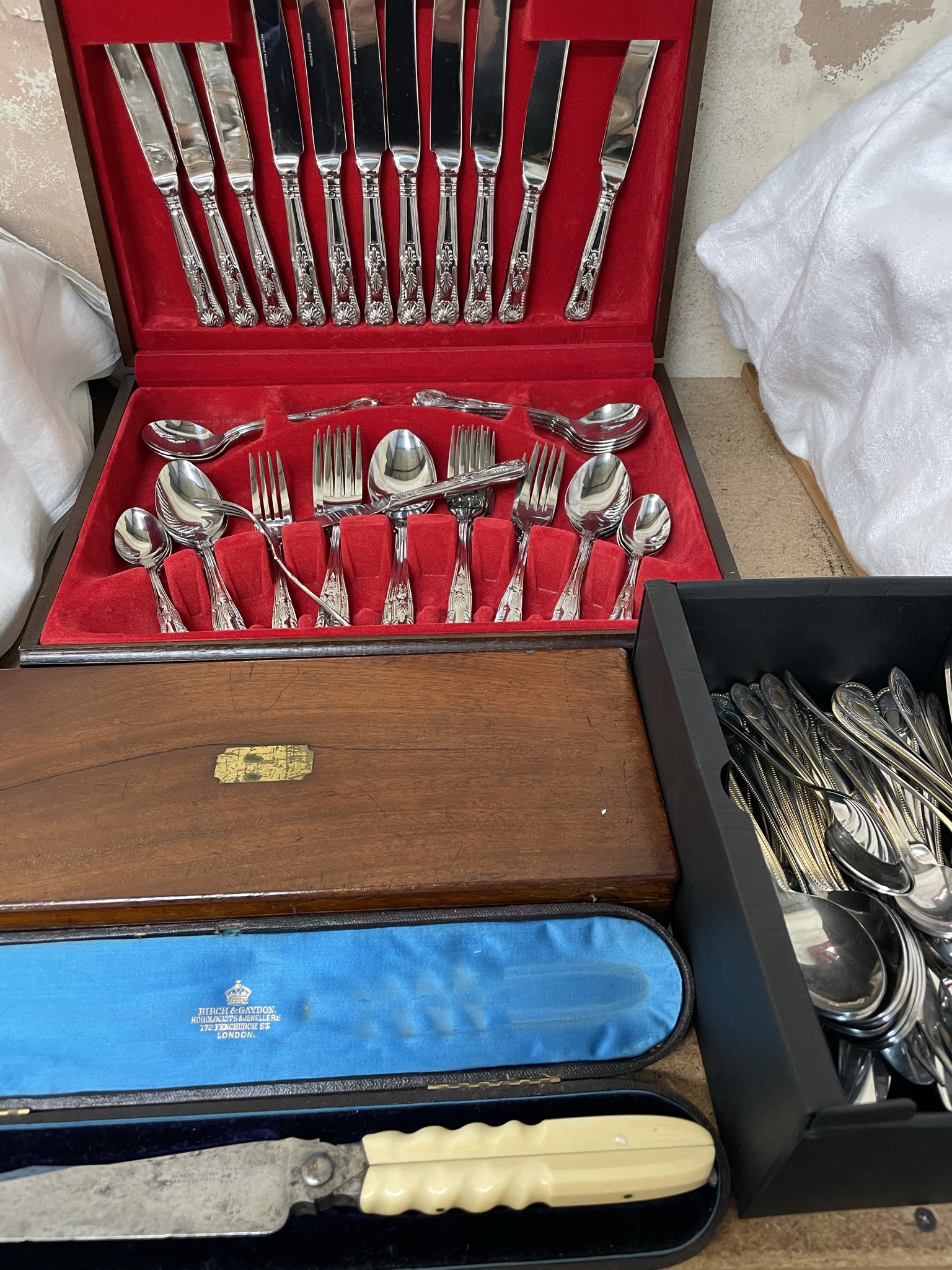 An Oneida part flatware service together with another part flatware service, geometry set,