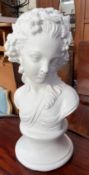 A white painted reconstituted stone head and shoulders portrait bust of a maiden,