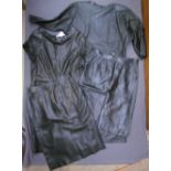 Two black leather Yves St Laurent skirts EU size 40 & 42 together with two black leather dresses,