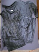 Two black leather Yves St Laurent skirts EU size 40 & 42 together with two black leather dresses,