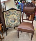 An Edwardian mahogany fire screen, with a shell carved cresting and leaf capped feet,