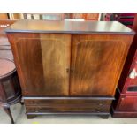 A mahogany television cabinet,