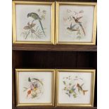 A set of four framed tiles,