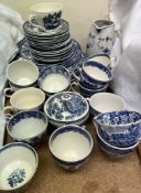 A collection of blue and white pottery part tea sets etc