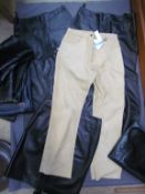 Three pairs of black leather trousers,