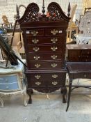A reproduction mahogany chest on chest,