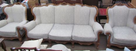 A continental upholstered three piece suite,