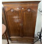 A 20th century mahogany wardrobe,