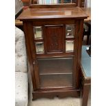 An Edwardian mahogany music cabinet,