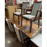 A G-Plan teak side cabinet together with a teak refectory type table and a set of six teak dining