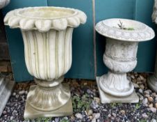 A reconstituted stone lorus leaf shaped urn on a square pedestal together with another moulded urn