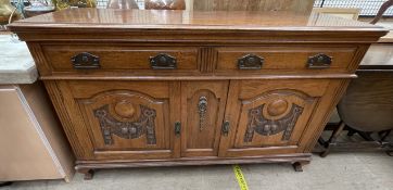 A 20th century oak sideboard,