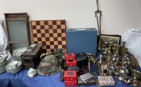 A large lot including wash boards, chess boards, part dinner set, brass candlesticks, brass cannon,